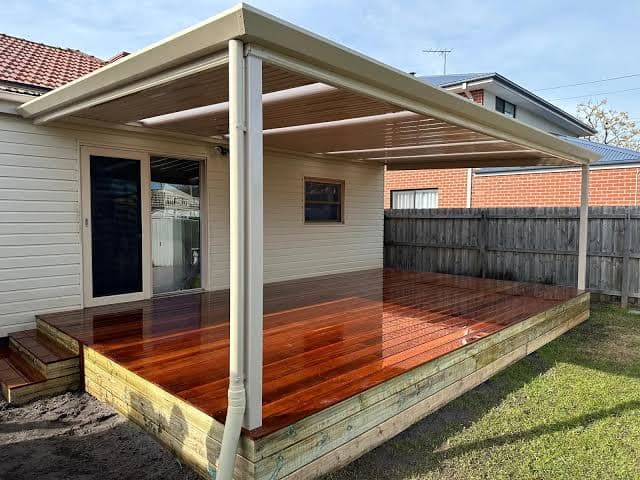 Flat-roof pergola over dining table, Frankston